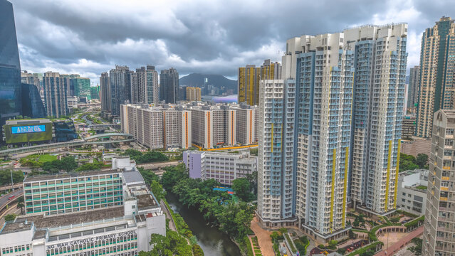 Hong Kong. July 5 2026 San Po Kong Skyline Beneath Dramatic Mountain