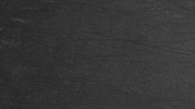 Black paper texture animated background.  Stop motion animated crumpled black paper texture background. Use for background and texture. Black paper background.  4K animated video.