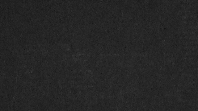 Paper texture background - Animation. 4k black grunge gritty abstract background loop animation,  Scratches and dust dark grunge paper background. Dark grunge textures animation.