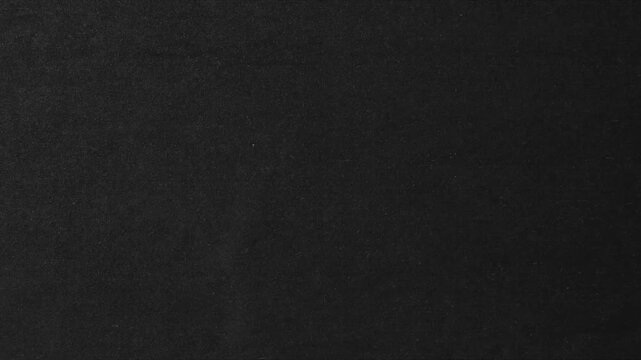 Stop motion real paper texture overlay black and white screen. Paper Animated Background. Black Paper texture background loop, grunge texture background. black paper texture.