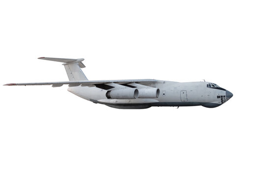 Big white transport aircraft flying isolated