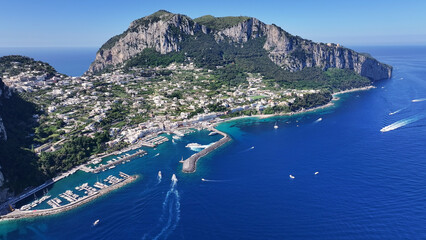Fototapeta premium Island Of Capri In Naples Campania Italy. Turquoise Ocean Waves Gently Crashing On Tropical Beach. Island Life Landscape Peaceful Beautiful. Island Life Watercolor Coast. Naples Campania.