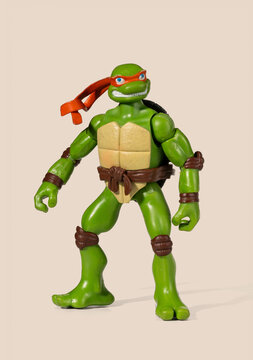 Michelangelo action figure from Teenage Mutant Ninja Turtles standing, ready for play