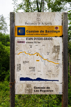Las Regueras, Spain - May 14, 2025. An official Camino de Santiago information board displaying the map and elevation profile for the Oviedo to Grado stage on the Camino Primitivo.