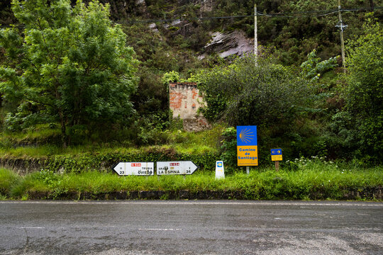 Traditional pilgrim milestone and traffic indicators in Asturias, Spain