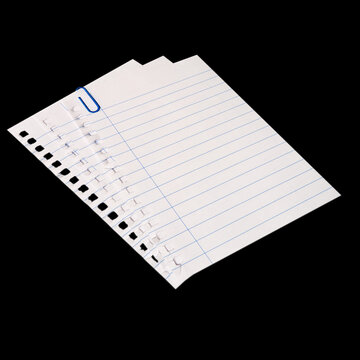 Notebook paper page isolated on black JPEG background, lying on a shelf.