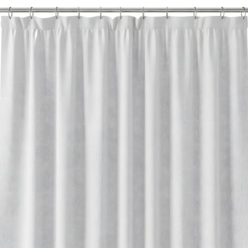 Vertical gray pixelated curtain with hanging rods