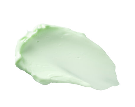 Green cosmetic cream swatch isolated on transparent background. Macro of soft pastel green skincare moisturizer lotion smear. Organic beauty product sample.