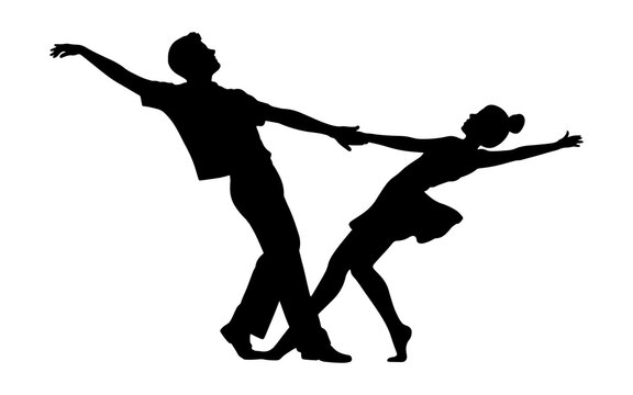 Silhouette of a graceful male and female dancing couple performing contemporary or ballroom choreography