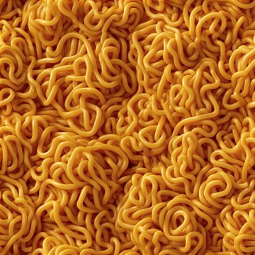 A pile of golden curly uncooked instant noodles fills the entire frame