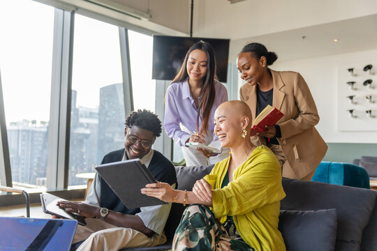 Group of Diverse People Working Together in a Modern Office Space