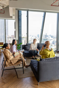Businesswoman Meeting in a Modern Office With City View in the Daytime