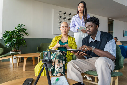 Meeting in a Modern Cafe With Discussions About Work Tasks