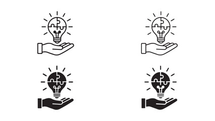 Hand Holding Lightbulb with Puzzle Piece Inside - Creative Solution Concept © Anzuman