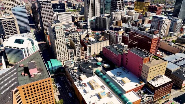 drone footage capturing the heart of Indianapolis, Indiana, showcasing its iconic skyline, contemporary architecture, commercial district, and expansive city layout from a breathtaking perspective abo