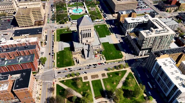 drone footage capturing the heart of Indianapolis, Indiana, showcasing its iconic skyline, contemporary architecture, commercial district, and expansive city layout from a breathtaking perspective abo