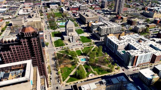 drone footage capturing the heart of Indianapolis, Indiana, showcasing its iconic skyline, contemporary architecture, commercial district, and expansive city layout from a breathtaking perspective abo
