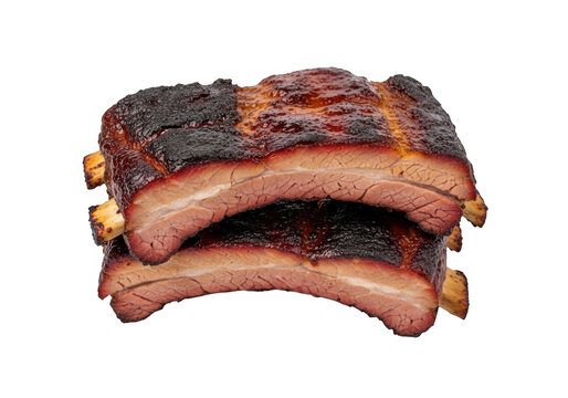 Two stacked pieces of grilled pork ribs isolated on transparent background