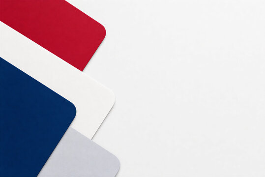 Minimalist paper background with red, white, and blue layers. Abstract geometric stationery mockup. Patriotic color palette for corporate branding.