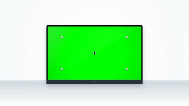 Modern Flat Screen Television Monitor With Green Chroma Key Display Screen and Motion Tracking Points for Professional Video Compositing and Media Editing