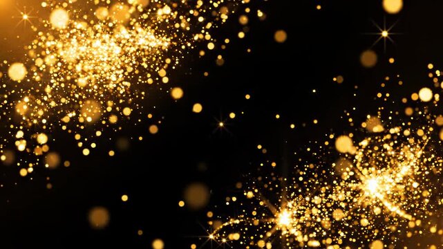 Abstract golden glitter particles and bokeh lights on black background