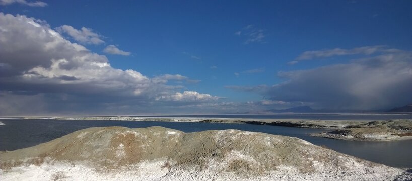 Dramatic Cloudscape Above White Mineral Hills