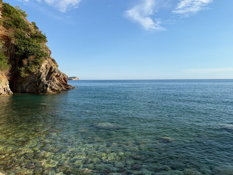 Rocky Adriatic Sea beach with crystal clear blue water and scenic Mediterranean coastline, peaceful summer travel destination