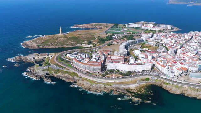 Aerial View of A Coru&ntilde;a City Peninsula, Urban Beaches, Cruise Port, and the Ancient Tower of Hercules Lighthouse in Galicia, Spain