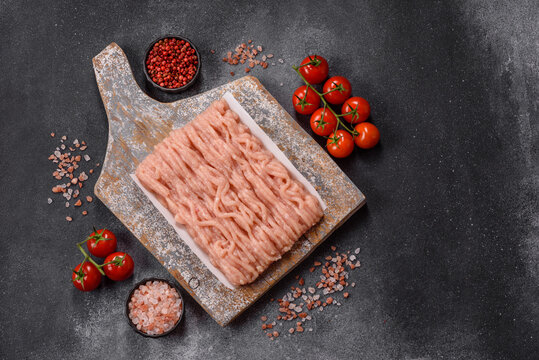 Fresh raw ground chicken, poultry meat for home cooking. Ground chicken