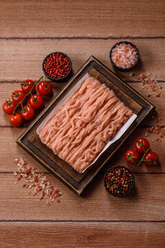 Fresh raw ground chicken, poultry meat for home cooking. Ground chicken