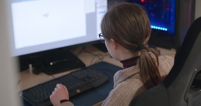 Girl with Glasses Drawing Picture on Desktop Computer Monitor. 4K 10-bit