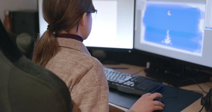 Girl with Glasses Drawing Picture on Desktop Computer Monitor. 4K 10-bit