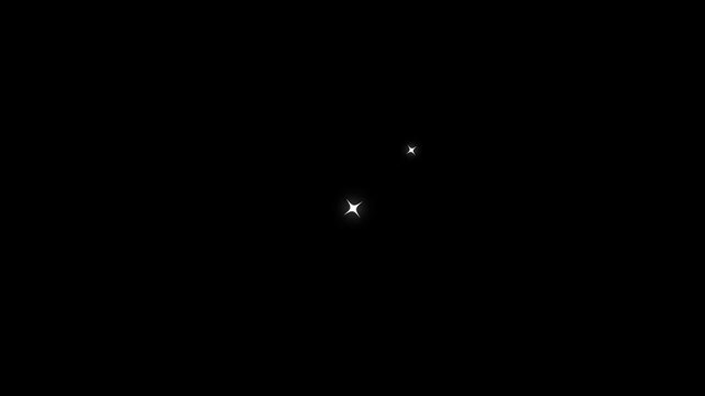 Gentle white sparkles animating on a dark background with subtle camera drift for magical effects