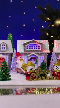 A yellow car drives through a beautiful Christmas town