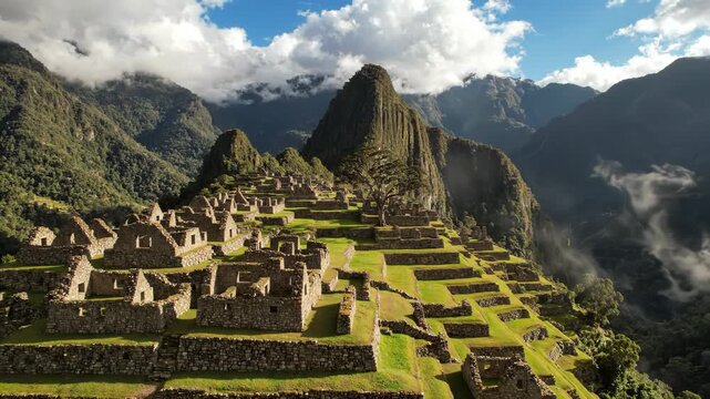 Ancient incan ruins of machu picchu in the andes mountains of peru