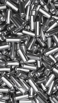 Realistic camera pan across aluminum beverage cans in silver for beverage packaging and drink industry presentation. Vertical video.