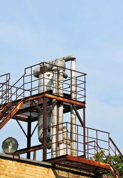 Pipes of old boiler-house with heat insulation