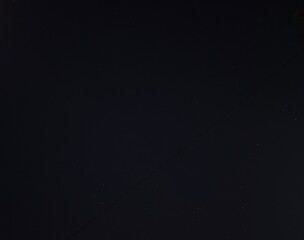 Night sky clear dark sky with stars and overhead power lines, suitable for astronomy concepts, space backgrounds, nature, wallpapers and educational projects © kodhibanks