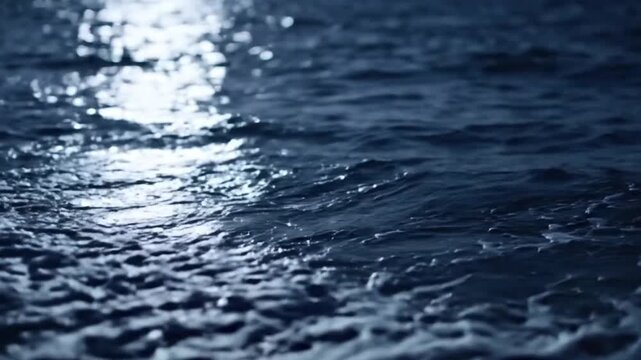 Dark Blue Ocean Waves Reflecting Moonlight