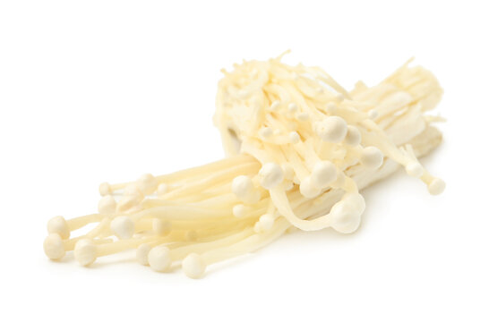 Clusters of raw enoki mushrooms isolated on white