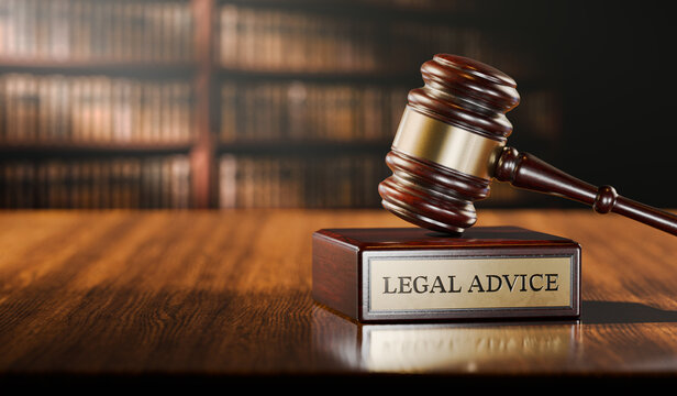 Legal advice:: Judge's Gavel and wooden stand with text word