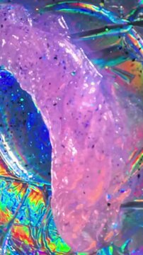 Glitter slime with holographic background