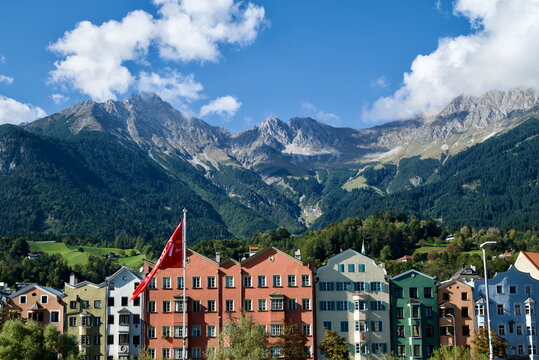 Classic Architectural Photo of Colorful Mariahilf Row Houses and Mountains Innsbruck Austria