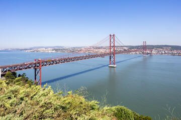 Fototapeta premium Ponte 25 de Abril suspension bridge over Tagus River in Lisbon, Portugal