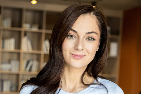 Portrait of a young caucasian dark-haired woman