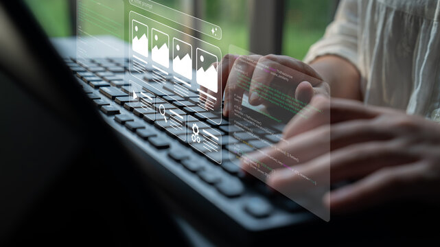 A person engaged in content creation on a laptop, showcasing a digital overlay of interface elements, embodying modern technology and creative processes in a workspace. Ledger