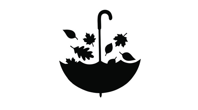 Black silhouette of an umbrella catching falling autumn leaves