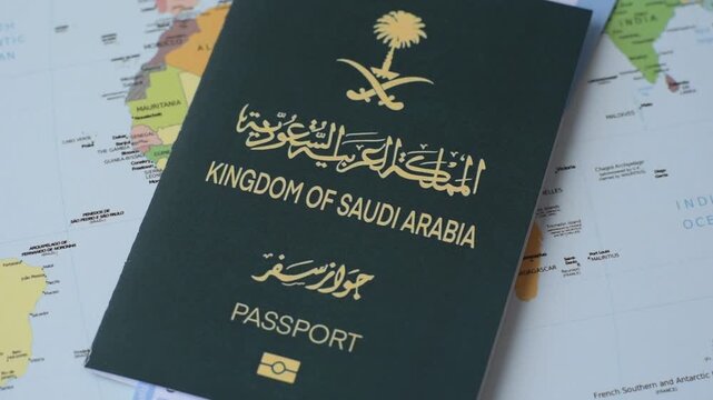 Saudi Arabia passport or id document with tickets for flight, travel, border crossing. Saudi Arabia passport and tickets as a background for your design