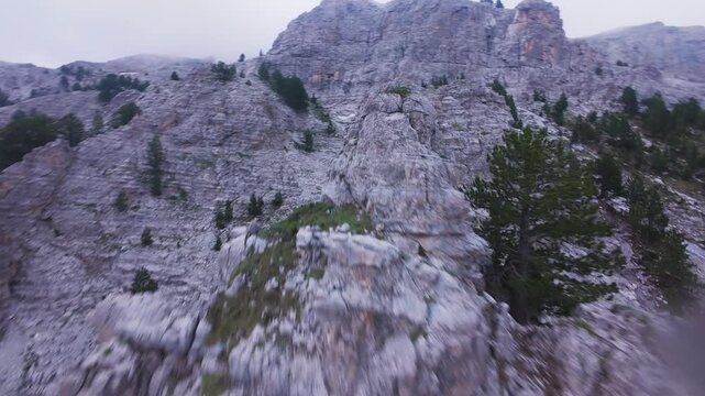 Dynamic FPV drone shot climbing along sharp crest of Mount Olympus Greece