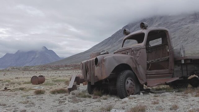 Abandoned Truck, Fuel Barrels and Containers in Ikkatteq, East Greenland